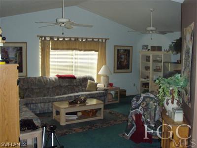 9167 Henry Road Fort Myers, FL 33967 - Photo 9 of 10 a living room with furniture and a window