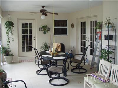 9167 Henry Road Fort Myers, FL 33967 - Photo 10 of 10 a work room with furniture potted plant and windows