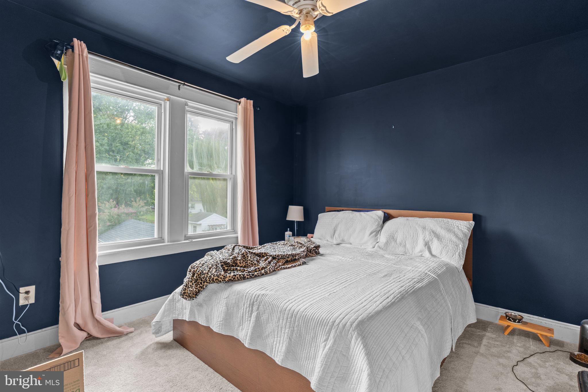 2114 Redwood Avenue Upper Chichester, PA 19061 - Photo 18 of 33 a bedroom with a bed and a window