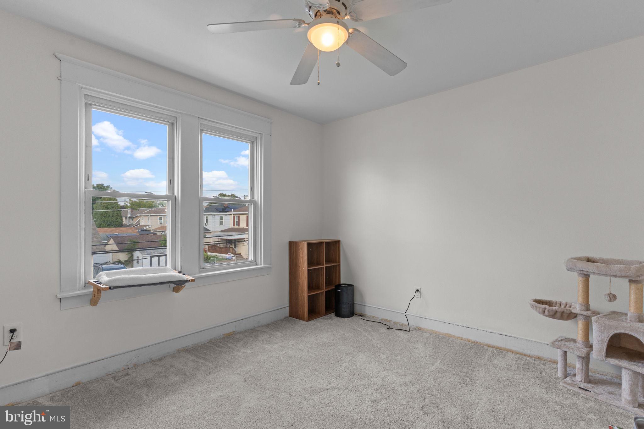 2114 Redwood Avenue Upper Chichester, PA 19061 - Photo 20 of 33 a view of an empty room with a window