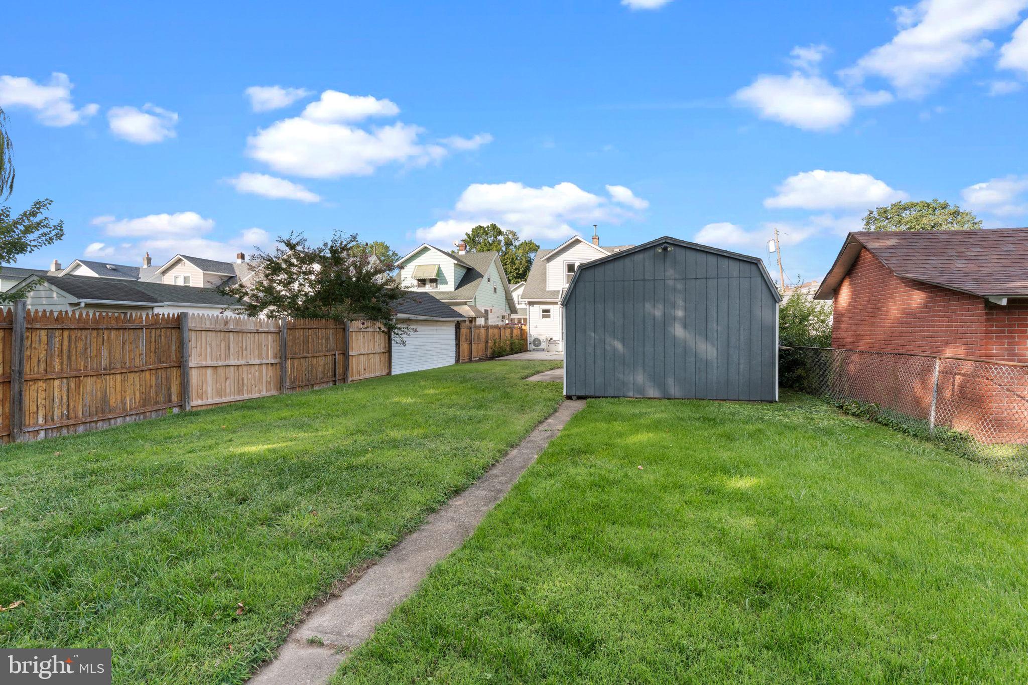 2114 Redwood Avenue Upper Chichester, PA 19061 - Photo 32 of 33 a view of a backyard with a garden