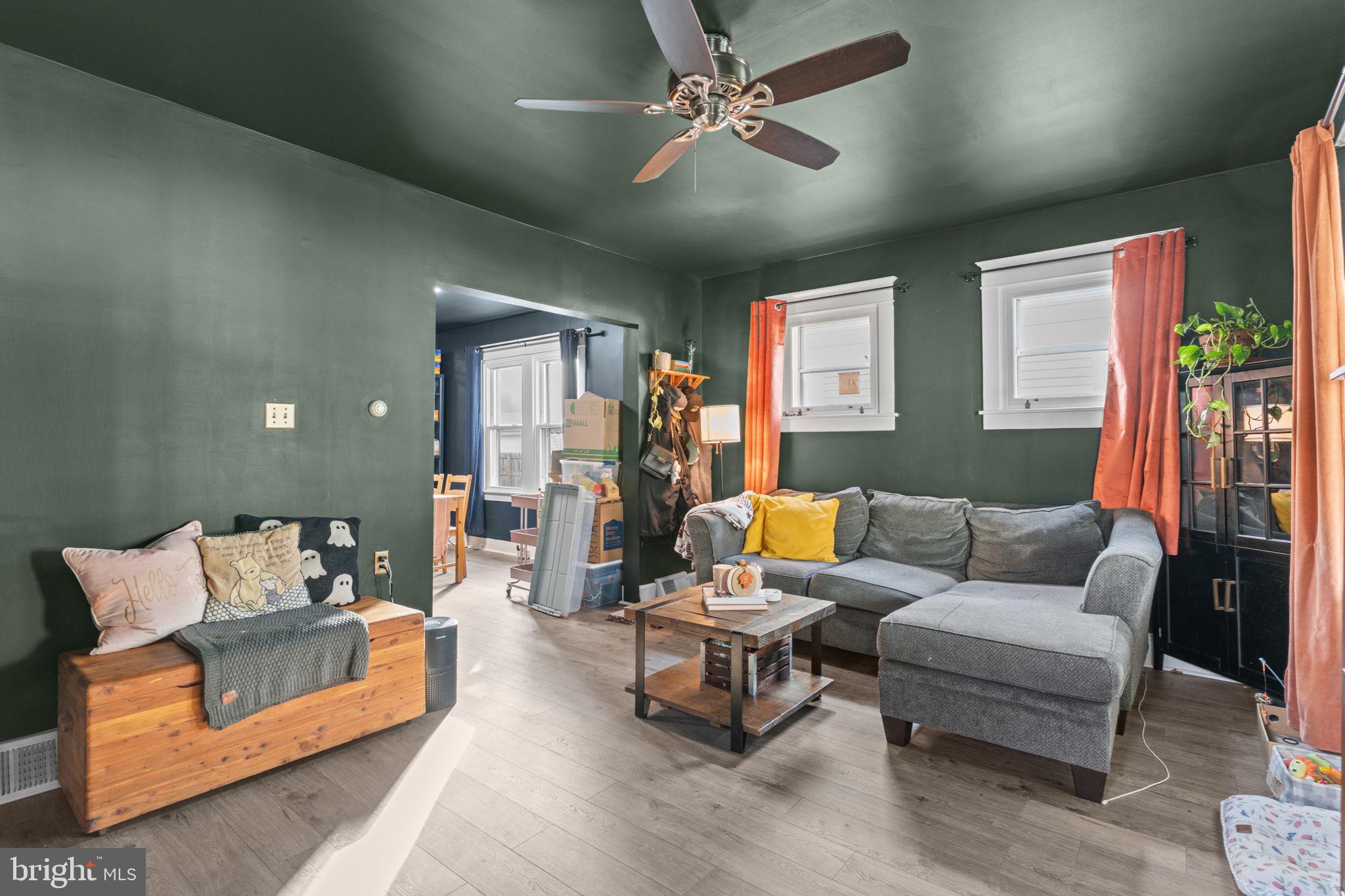 2114 Redwood Avenue Upper Chichester, PA 19061 - Photo 6 of 33 a living room with furniture and a ceiling fan