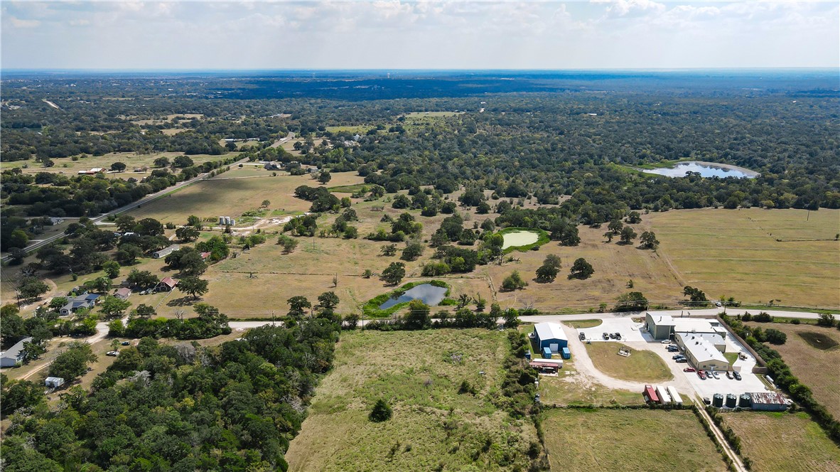4 Hopes Creek Road College Station, TX 77845 - Photo 5 of 6 an aerial view of residential houses with outdoor space