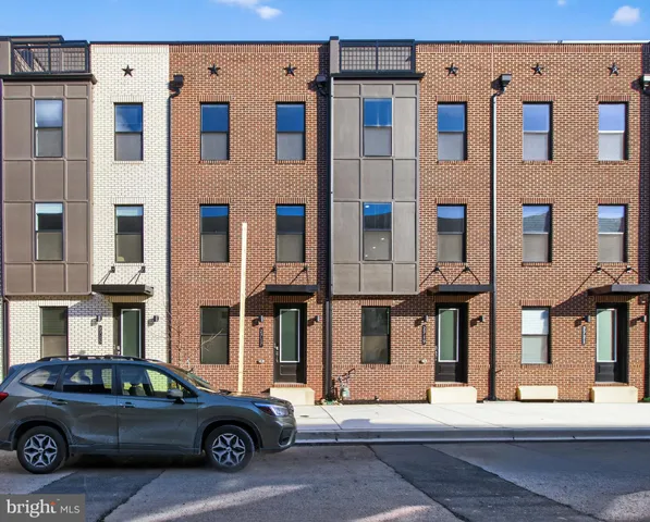 a car parked in front of a building