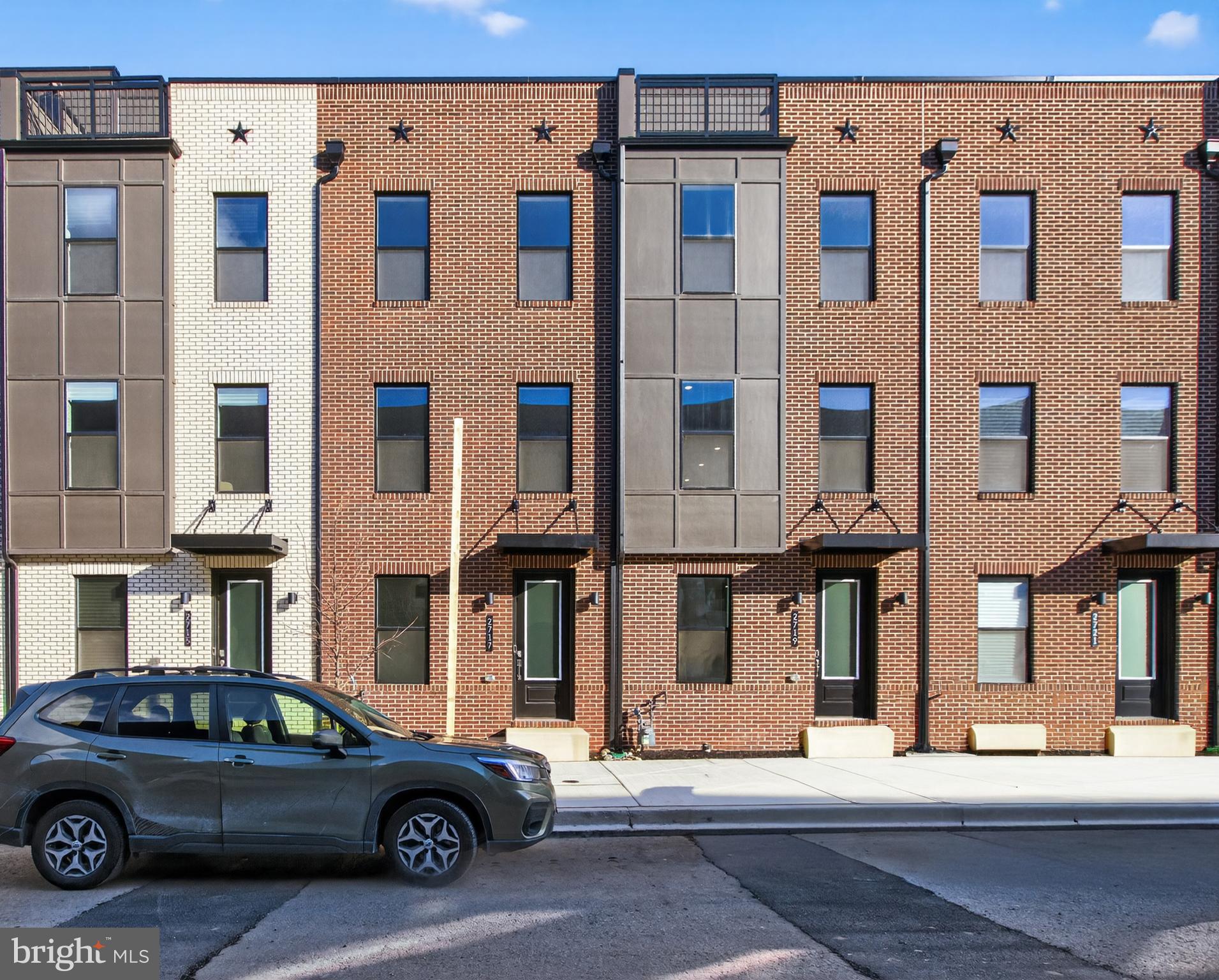 2717 Light Street Baltimore, MD 21230 - Photo 2 of 20 a car parked in front of a building