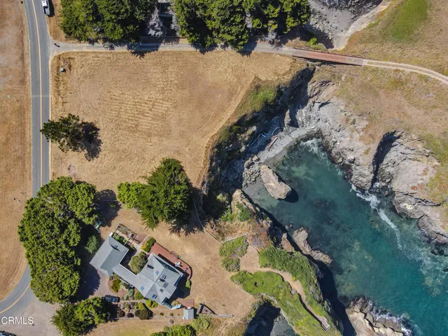 a view of a backyard of a house