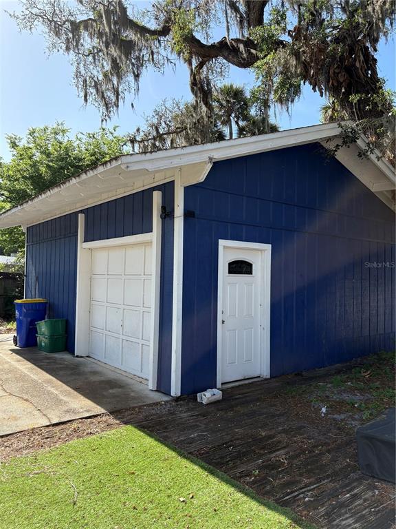 2203 Lime Tree Drive Edgewater, FL 32141 - Photo 3 of 10 a front view of a house with a yard