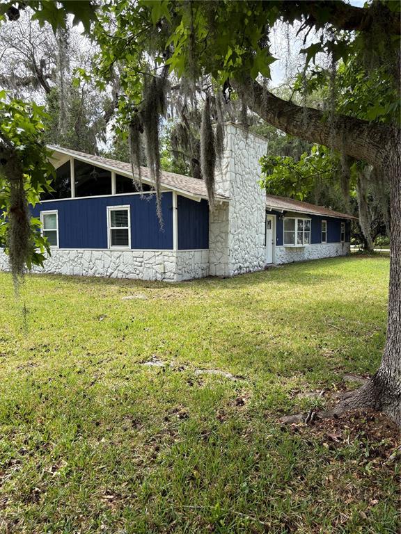 2203 Lime Tree Drive Edgewater, FL 32141 - Photo 10 of 10 a view of a house with a backyard