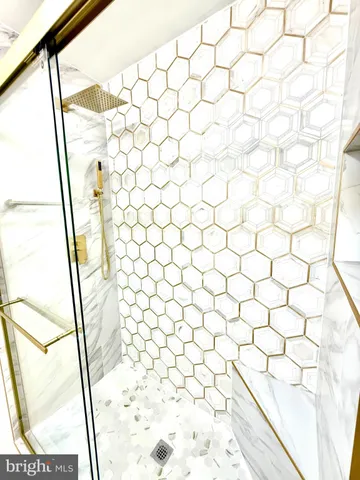 a bathroom with a shower curtain