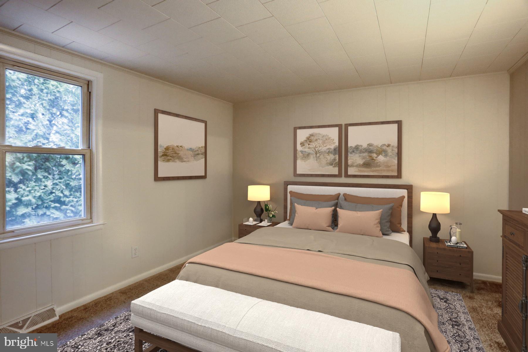 960 Butter Road Dover, PA 17315 - Photo 11 of 48 a bedroom with a large bed and a window