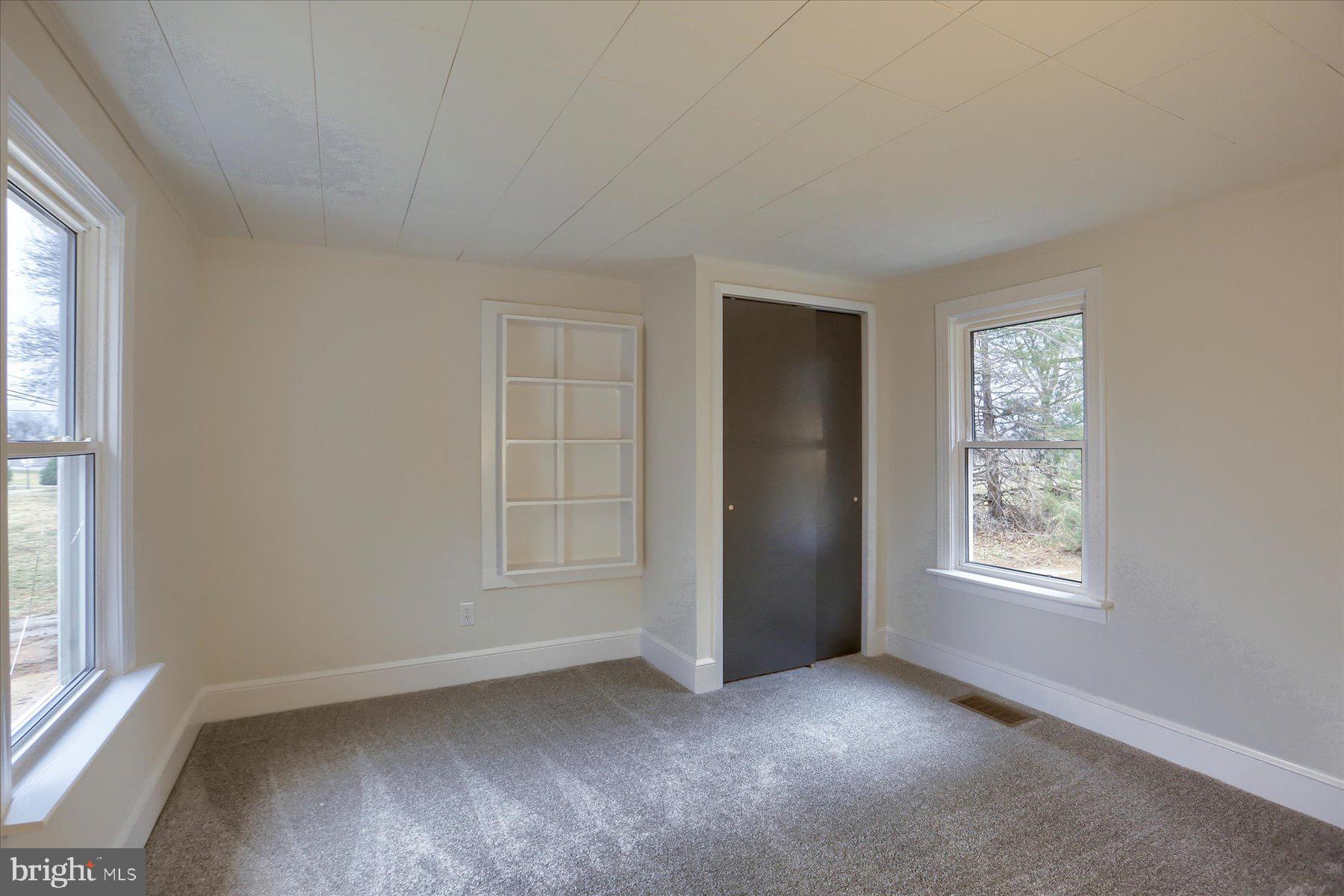 960 Butter Road Dover, PA 17315 - Photo 15 of 48 an empty room with windows