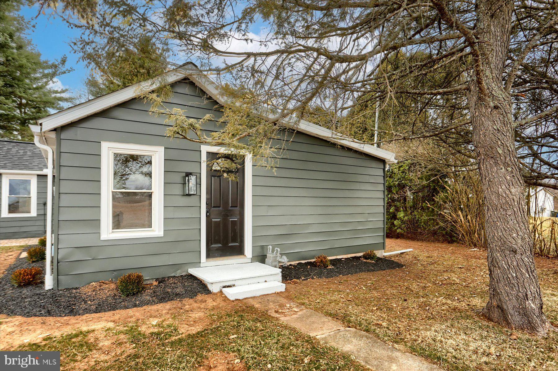 960 Butter Road Dover, PA 17315 - Photo 27 of 48 a front view of a house with a yard