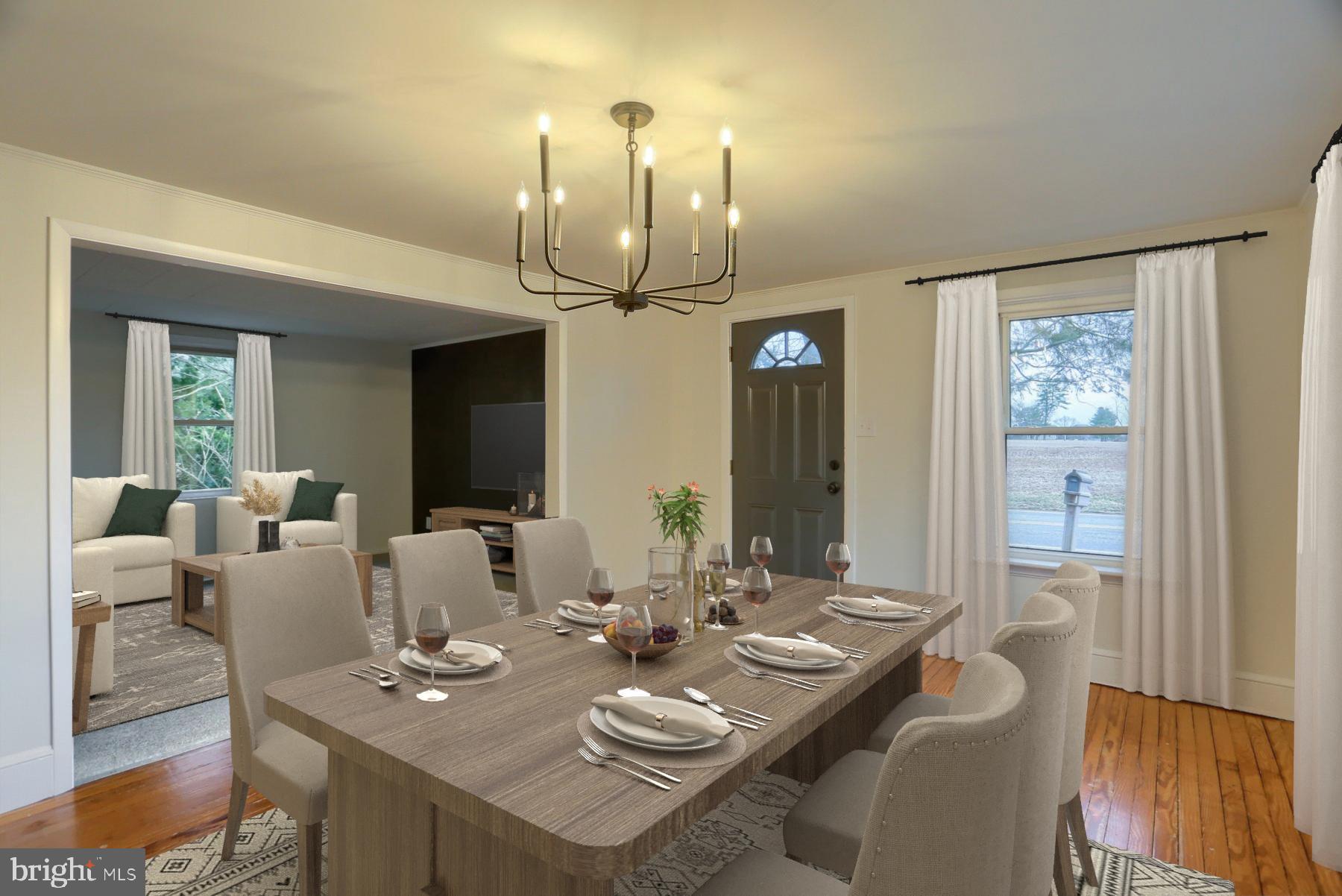960 Butter Road Dover, PA 17315 - Photo 6 of 48 a view of a dining room with furniture and wooden floor