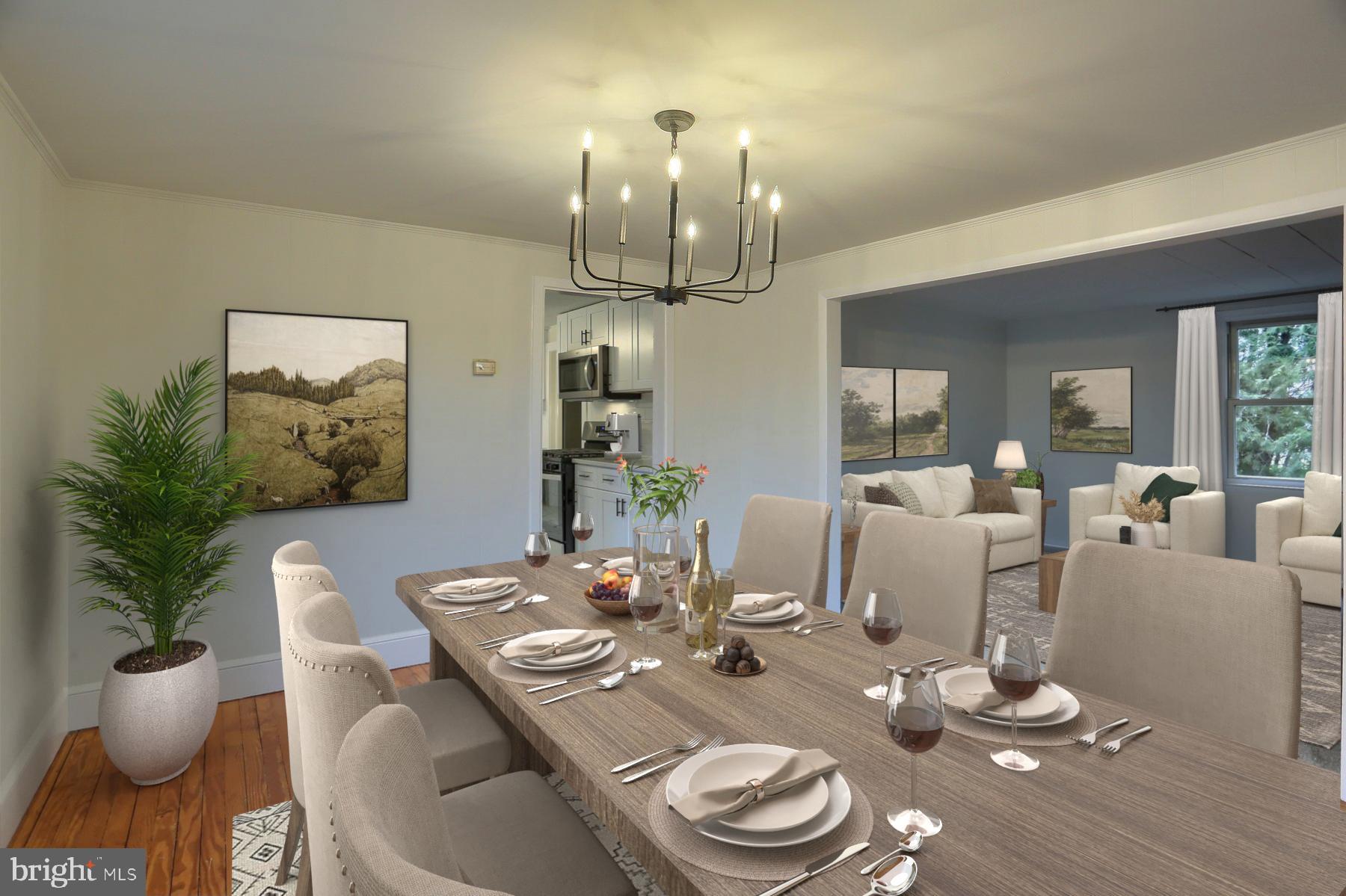 960 Butter Road Dover, PA 17315 - Photo 7 of 48 a dining room with wooden floor a chandelier a glass table and chairs