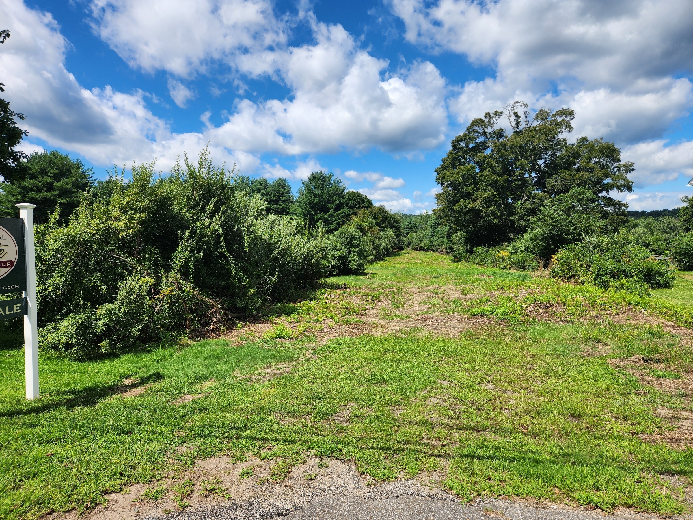 83 River Road Willington, CT 06279 - Photo 3 of 11 a view of a big yard with lots of green space