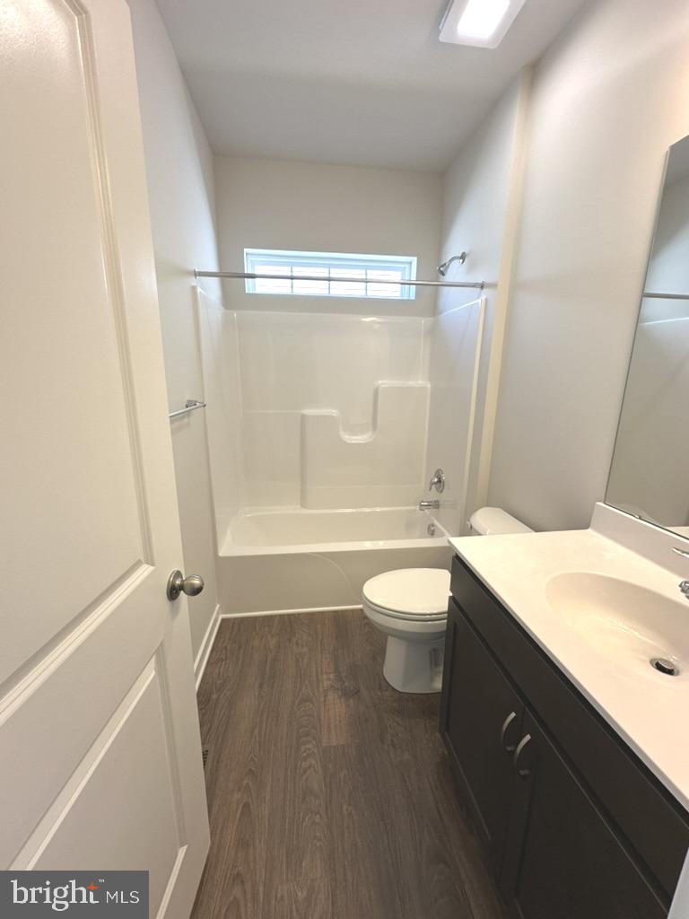 1019 Robinson Road Townsend, DE 19734 - Photo 5 of 13 a bathroom with a sink a toilet and shower