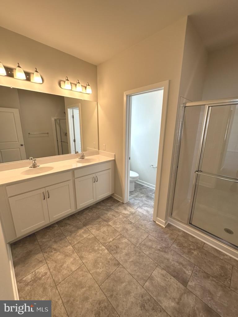 1019 Robinson Road Townsend, DE 19734 - Photo 10 of 13 a bathroom with a sink and a mirror