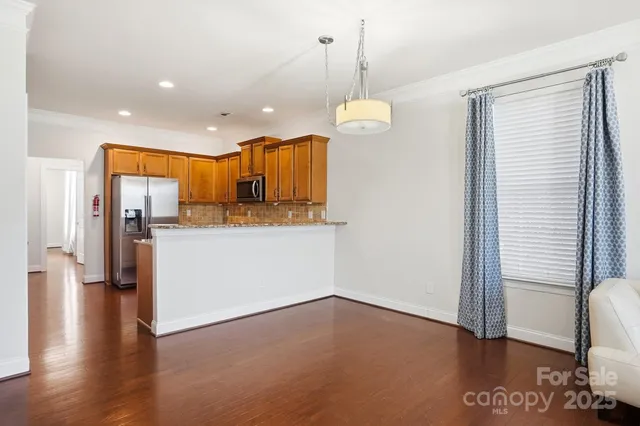 a bathroom with a sink toilet and a mirror