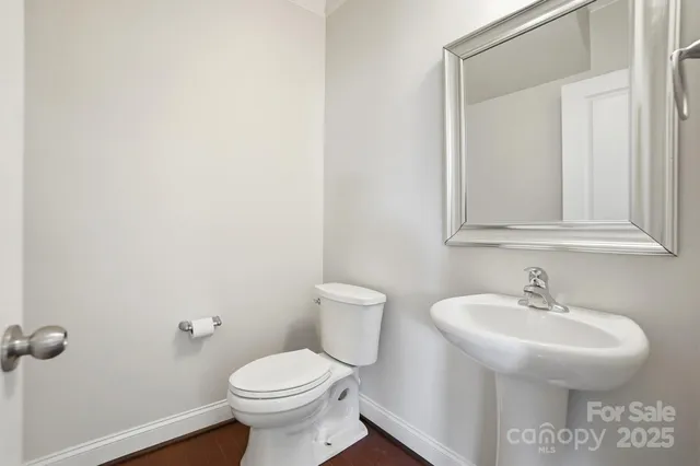 a bed room with a bed and a ceiling fan