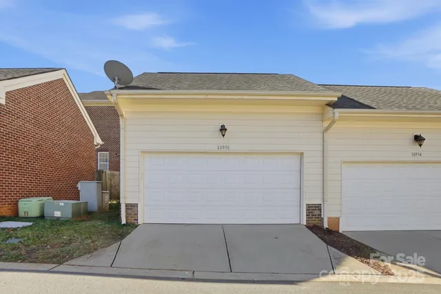 a view of a house with a road