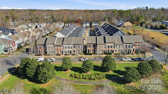 an aerial view of a city with lots of residential buildings