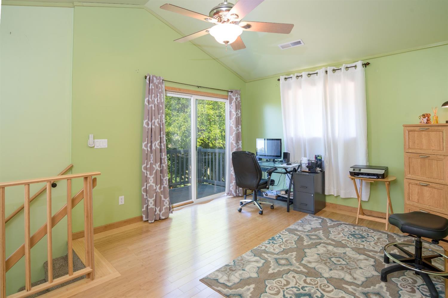 206 West Hilltop Road Talent, OR 97540 - Photo 18 of 29 a view of a workspace with furniture and a window