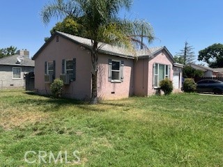 2238 Wood Street Merced, CA 95340 - Photo 3 of 15 a front view of house with a garden