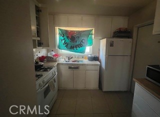 2238 Wood Street Merced, CA 95340 - Photo 7 of 15 a utility room with sink dryer and washer