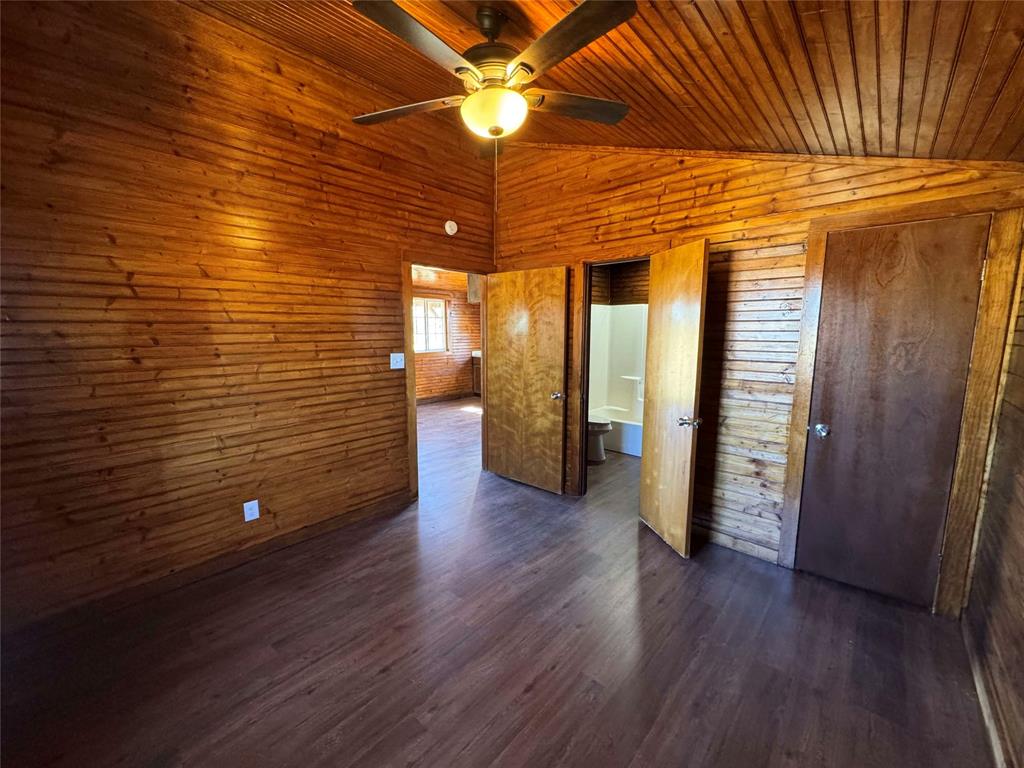 184 County Road Pattonville, TX 75468 - Photo 13 of 20 a view of a livingroom with wooden floor