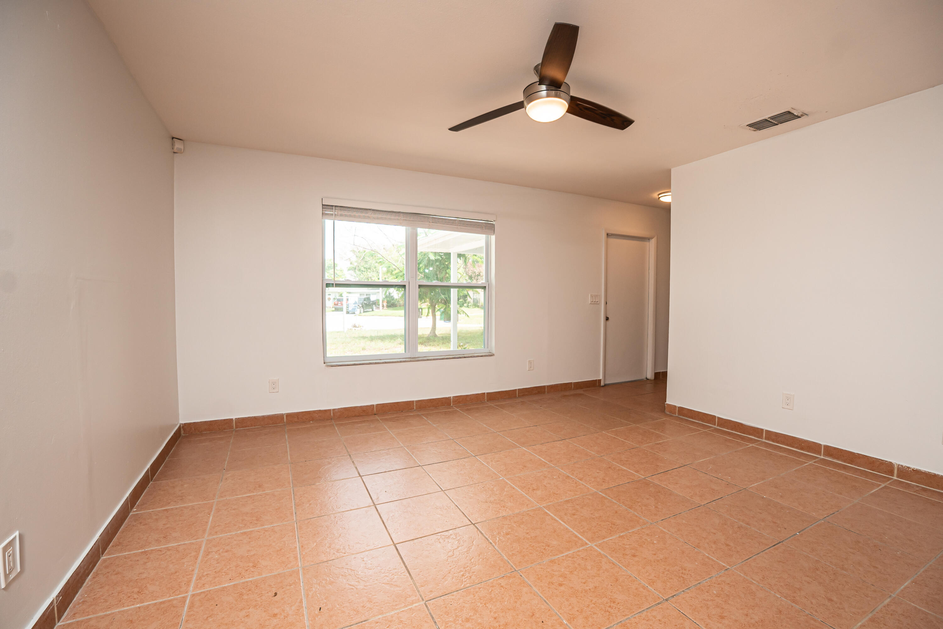 402 Southwest Ruffner Court Port St. Lucie, FL 34953 - Photo 4 of 29 Photo Jun 18 2026, 10 31 38 AM