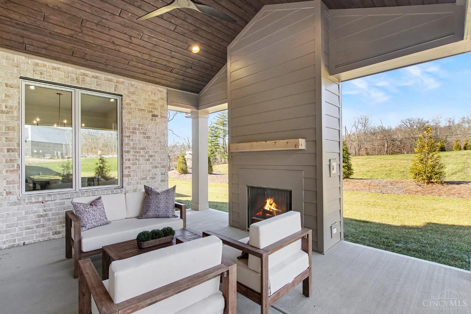 6956 Shadow Ridge Road Cincinnati, OH 45230 - Photo 32 of 37 Covered Porch with Gas Fireplace