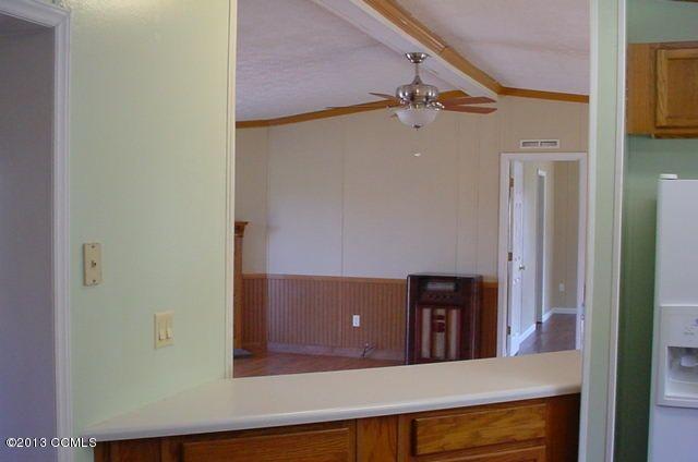 280 Norris Road Swansboro, NC 28584 - Photo 13 of 16 bar between Kitchen & Living area