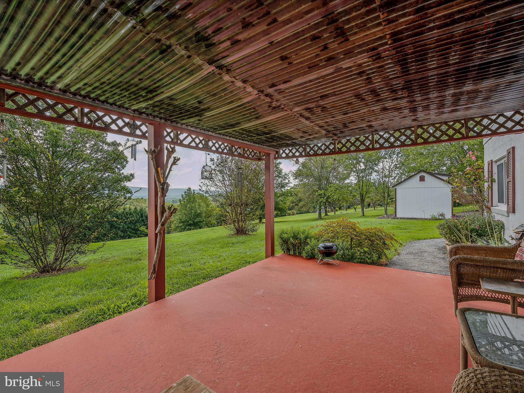 1165 Waugh Road Berkeley Springs, WV 25411 - Photo 57 of 86 Back Patio & Yard