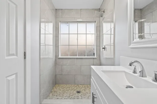 a bathroom with a sink and a bathtub
