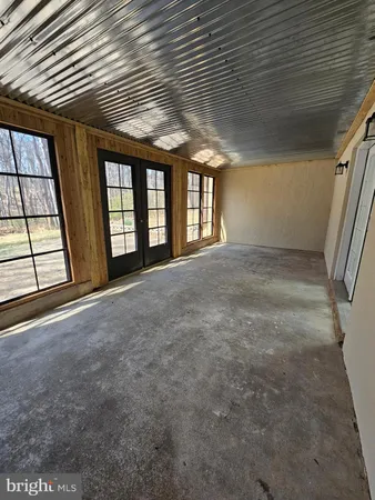 a view of balcony with wooden floor