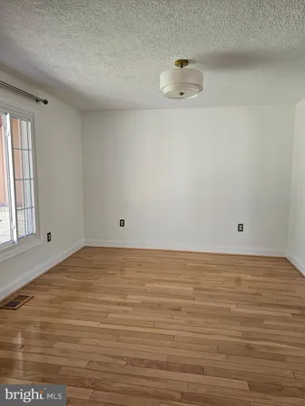 a kitchen with stainless steel appliances a refrigerator and a stove