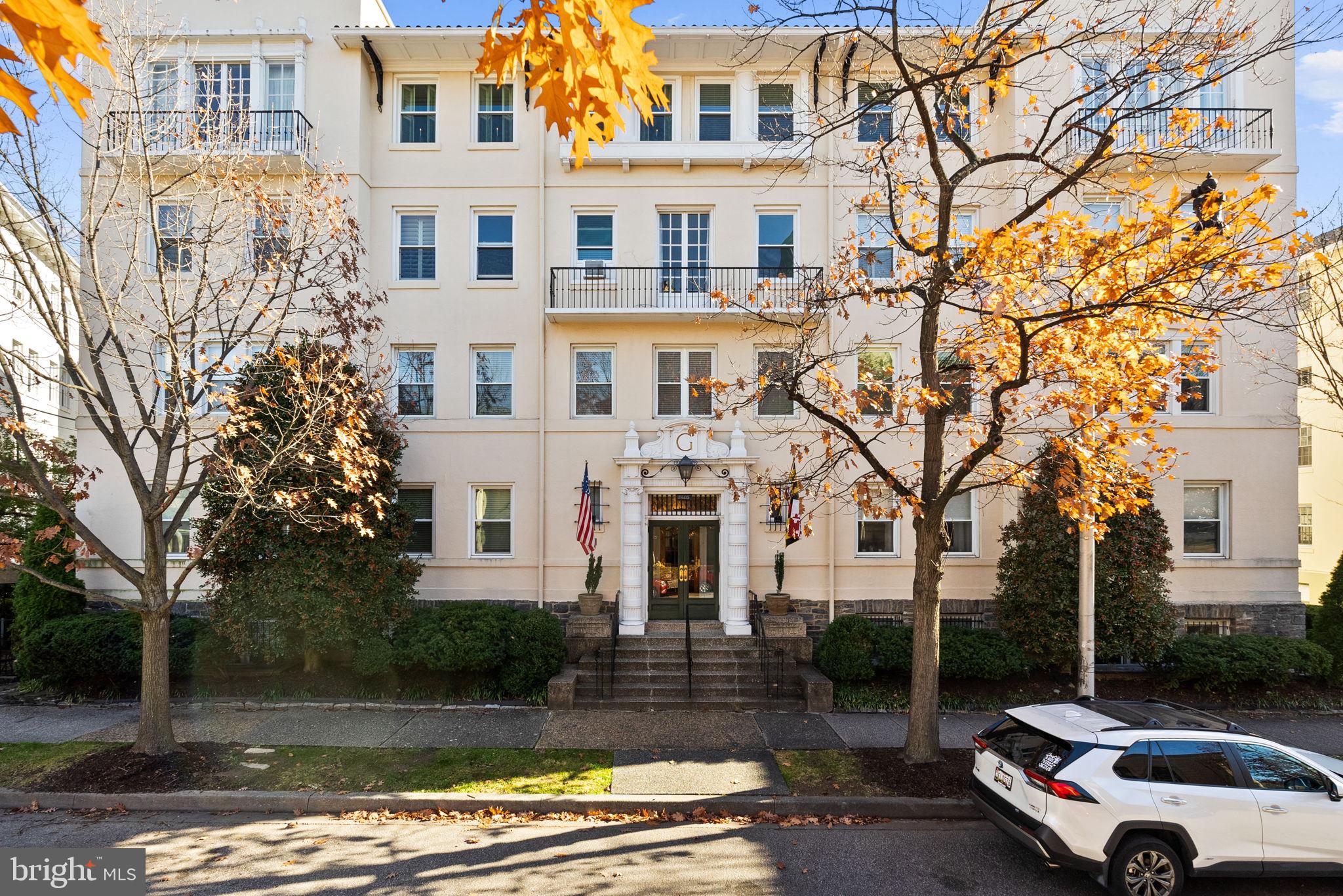 3405 Greenway, Unit 302 Baltimore, MD 21218 - Photo 1 of 42 a front view of a house with a yard