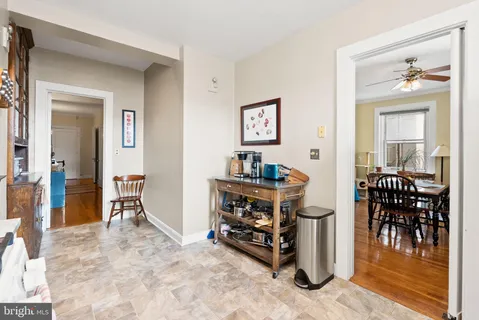 a view of a livingroom with furniture and hardwood floor