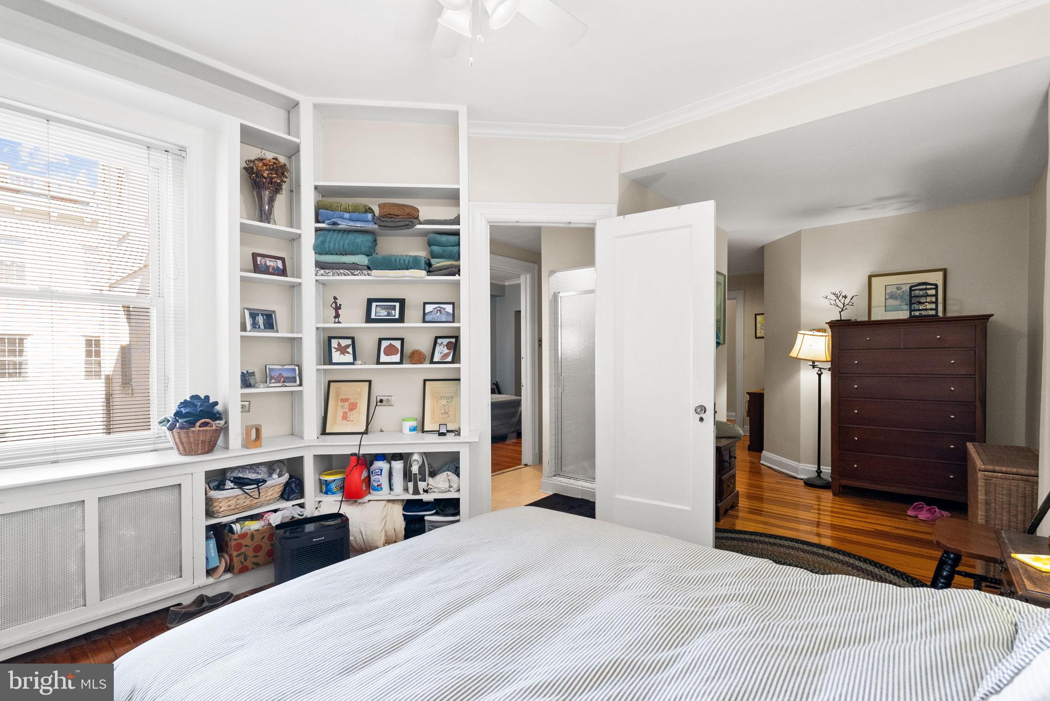 3405 Greenway, Unit 302 Baltimore, MD 21218 - Photo 28 of 42 a bed room with a bed and a television