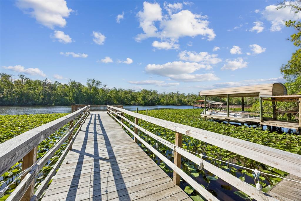 334 Paradise Circle Satsuma, FL 32189 - Photo 5 of 40 swimming view from balcony with seating space