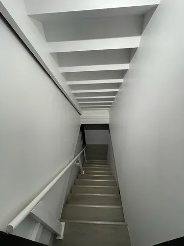 a view of an empty walk in closet