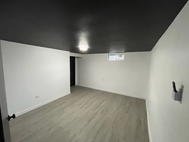 a view of a refrigerator in a room