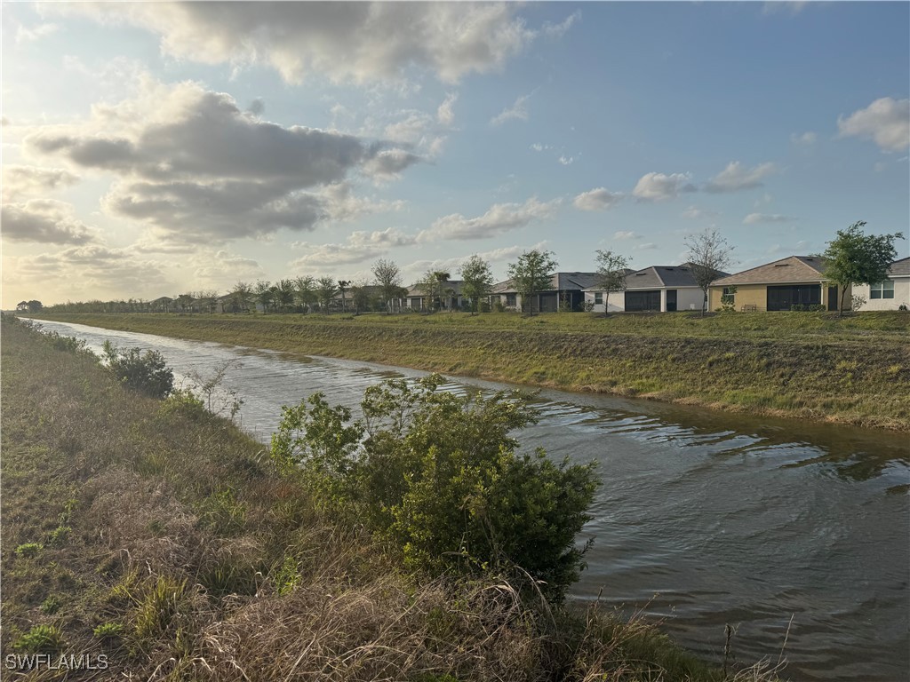 7500 Ruth Avenue North Lehigh Acres, FL 33971 - Photo 2 of 10 a view of an ocean beach