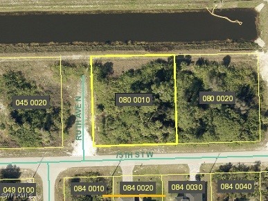 7500 Ruth Avenue North Lehigh Acres, FL 33971 - Photo 10 of 10 a view of a glass door with a lake