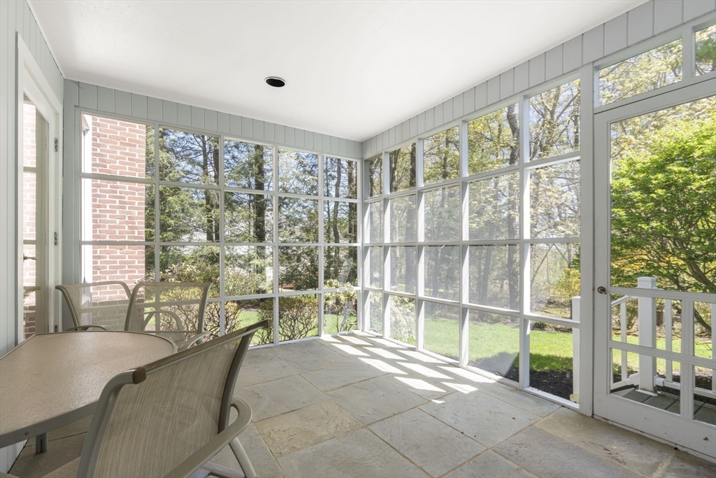 60 Whisper Drive Worcester, MA 01609 - Photo 18 of 39 a living room filled with furniture and large windows