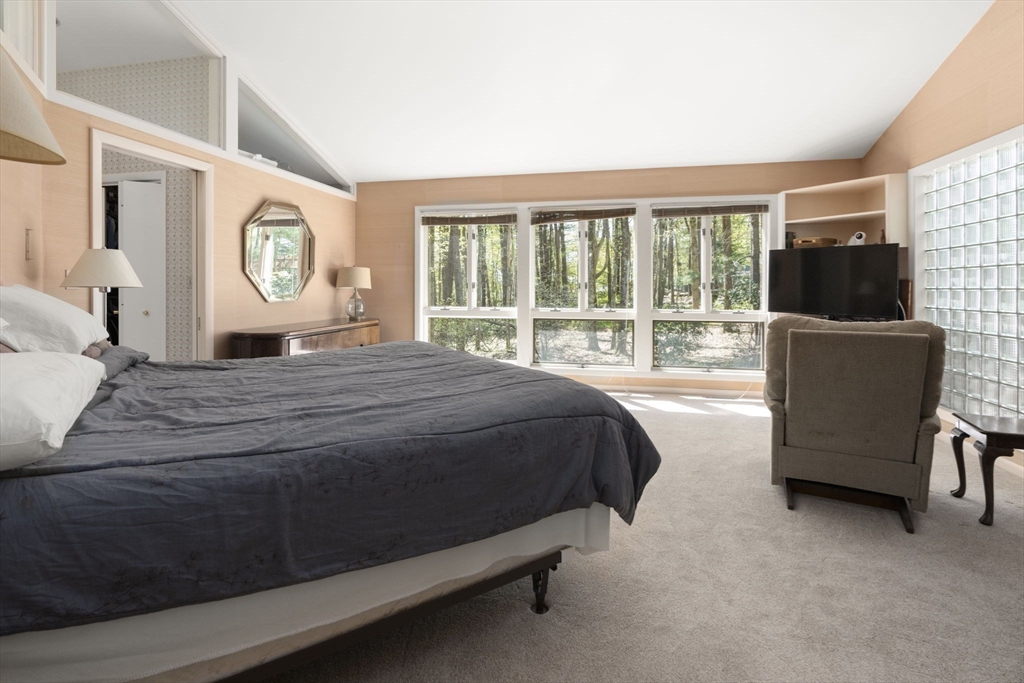 60 Whisper Drive Worcester, MA 01609 - Photo 21 of 39 a bedroom with a bed and a large window