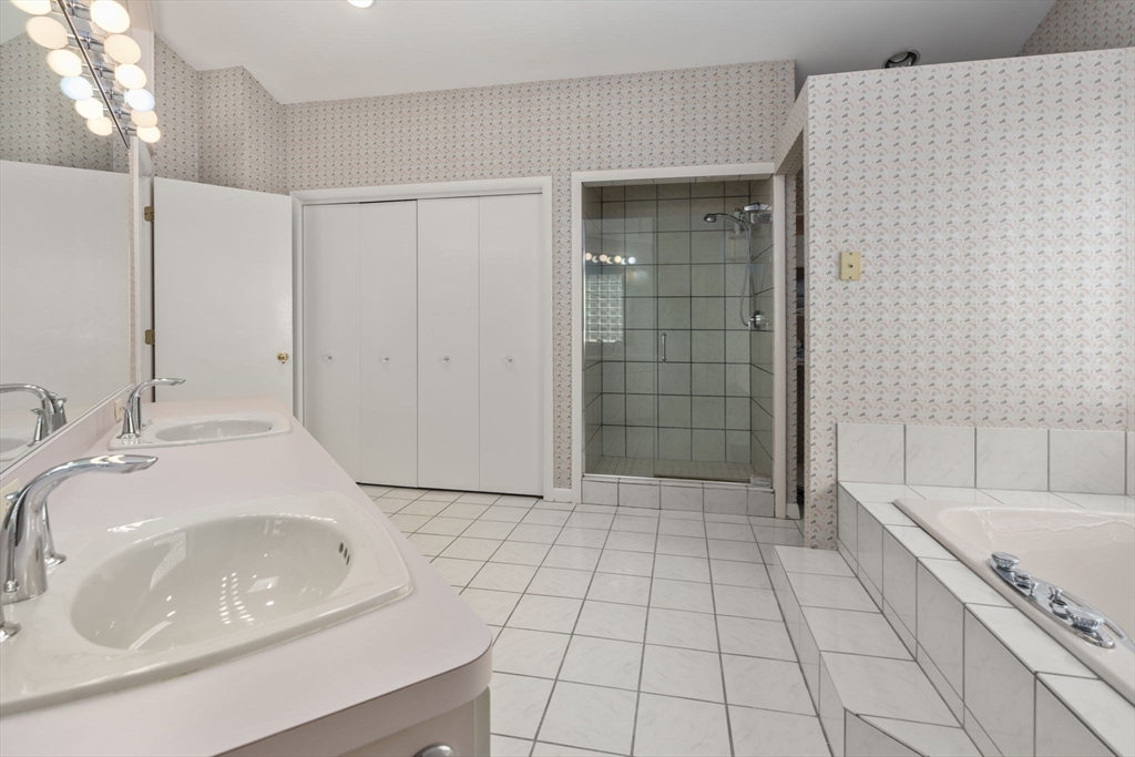 60 Whisper Drive Worcester, MA 01609 - Photo 23 of 39 a bathroom with a sink a toilet and shower