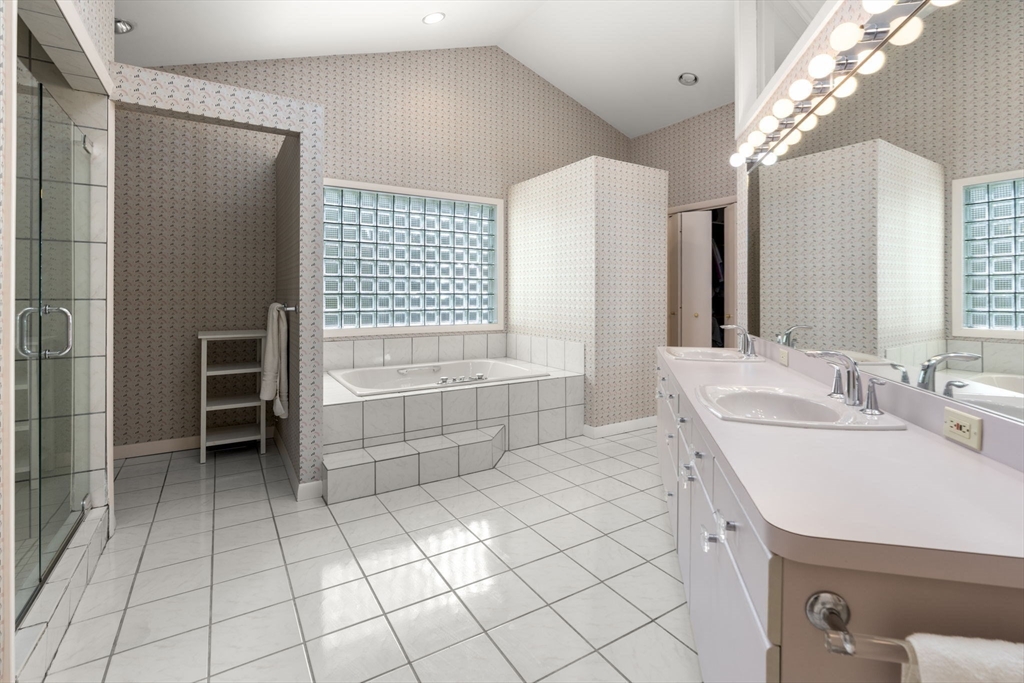 60 Whisper Drive Worcester, MA 01609 - Photo 24 of 39 a bathroom with a sink shower and a mirror