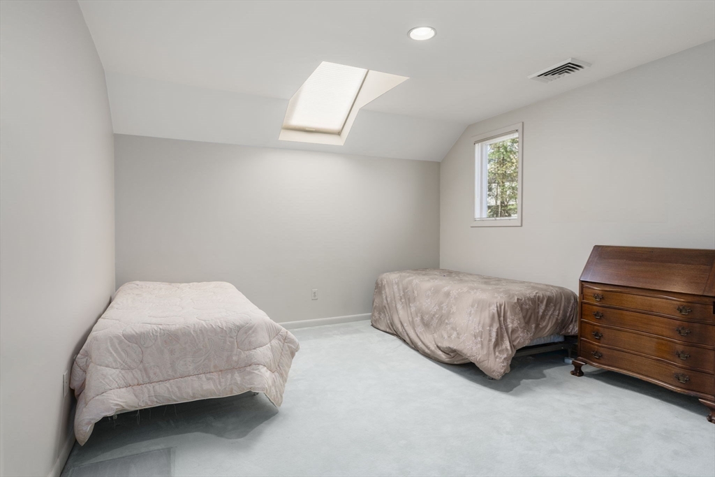 60 Whisper Drive Worcester, MA 01609 - Photo 26 of 39 a bedroom with a bed and a window