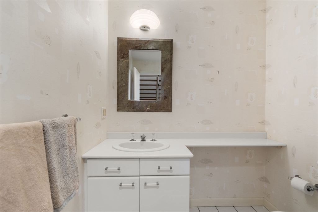 60 Whisper Drive Worcester, MA 01609 - Photo 28 of 39 a bathroom with a sink vanity and mirror